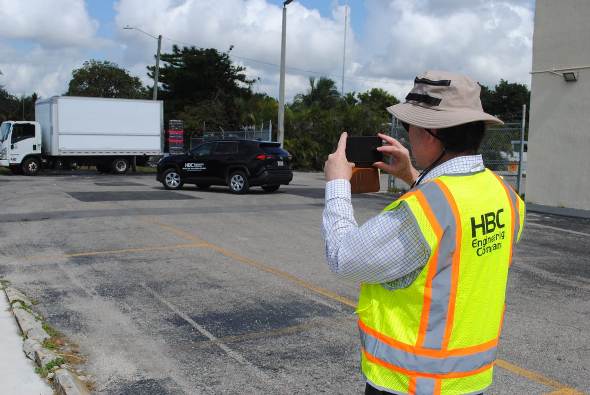 HBC team member documenting a project site